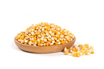 dry corn in plate isolated on white background.Unpopped popcorn