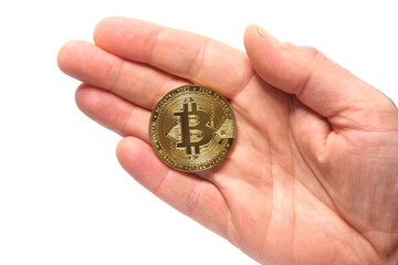 Bitcoin in hand in focus. White isolated background. Financial abstract background. Bank and money investment industry.