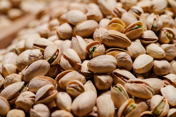 Pistachios nuts texture and background, close up