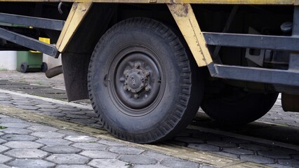 One side of dirty tire truck