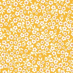 Seamless vintage pattern. cute white flowers and leaves . Yellow background. vector texture. fashionable print for textiles and wallpaper.