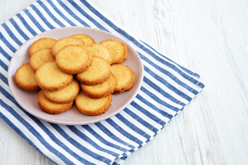 Homemade Pure Butter Shortbreads on a Pink Plate, side view. Space for text.