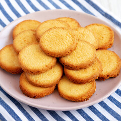 Homemade Pure Butter Shortbreads on a Pink Plate, low angle view.