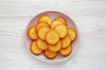 Homemade Pure Butter Shortbreads on a Pink Plate, top view. Flat lay, overhead, from above.