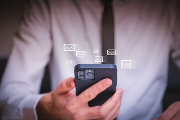 email marketing concept, person reading e-mail on smartphone, receive new message
