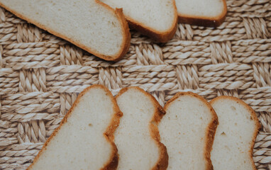 pieces of white bread on the table close up