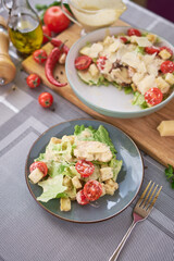 Healthy Grilled Chicken Caesar Salad with Cheese, tomatoes and Croutons
