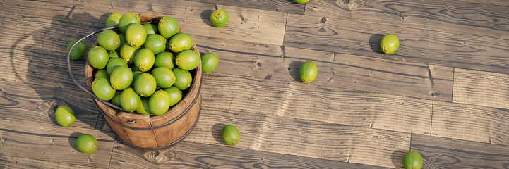 limes, juicy citrus fruits  in a wooden bucket