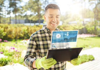 Fototapeta premium gardening, planting and technology concept - happy smiling man with tablet pc computer and virtual screen projection with growing chart at summer garden