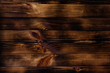 Old wooden board indoors on the floor close-up.