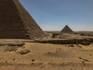 Popular tourist destination ancient Egyptian Giza city ruins of the pyramids of Gizeh close to...