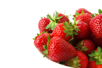 Red ripe strawberry in the white bowl, isolated