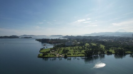 Kota Kinabalu, Sabah Malaysia – June 15, 2022: The Tanjung Aru Beach, Fisherman Village and Shangri-La Hotel
