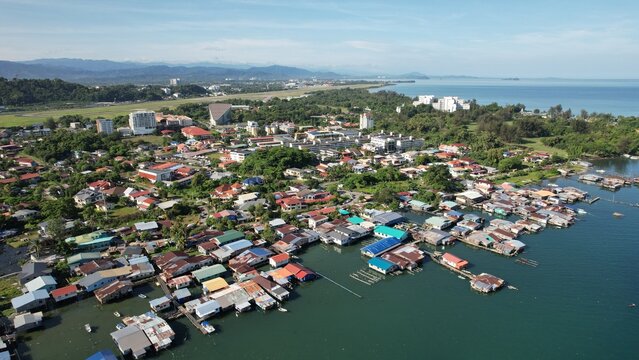 Kota Kinabalu, Sabah Malaysia – June 15, 2022: The Tanjung Aru Beach, Fisherman Village and Shangri-La Hotel