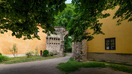 Obraz premium The unbuilt Monastery Church of the Virgin Mary is an unfinished Gothic building with a completed Baroque bell tower in Panensky Tynec