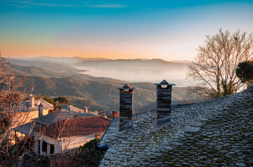 Milies Greece, Milies the  historic and the picteresque village of Pelion.  The famous train track of Moutzouris is located in short distance from the central square of village.