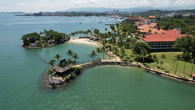 Kota Kinabalu, Sabah Malaysia &ndash; June 15, 2022: The Tanjung Aru Beach, Fisherman Village and Shangri-La Hotel