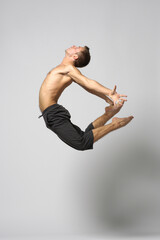 modern ballet male dancer posing over white studio background - 511011104
