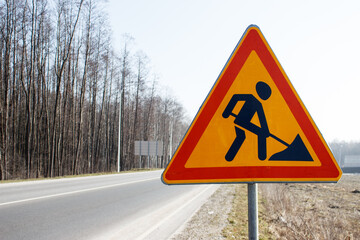 road work sign on the highway