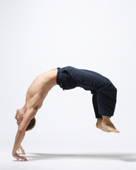 modern ballet male dancer posing over white studio background - 511012154