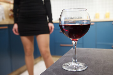 glass of wine is on the table