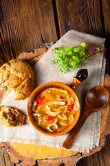 Spicy tripe soup with red paprika.
