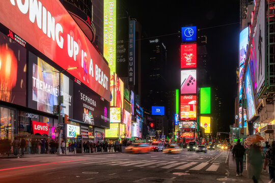 Night View Of The Times Square At Night In Manhattan, NY, USA. Times Square Is The Most Visited Tourist Attraction In The World.