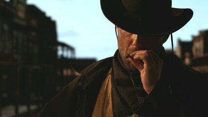 Portrait of cowboy smoking a cigar, old wild west city in the background. Spaghetti, macaroni western style cinematic footage - obrazy, fototapety, plakaty