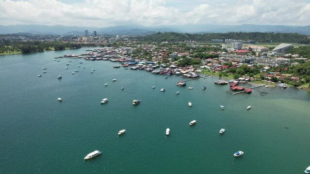 Kota Kinabalu, Sabah Malaysia &ndash; June 15, 2022: The Tanjung Aru Beach, Fisherman Village and Shangri-La Hotel