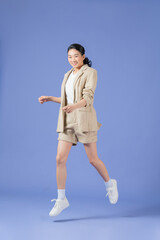 happy charming young woman free-time walk good mood isolated on purple background