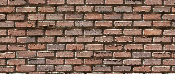 Aged brick wall texture. Seamless background pattern.