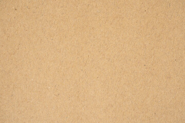 Fototapeta na wymiar warm beige kraft paper background texture. Eco friendly and recycled