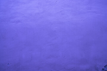 Light purple colored wall background with textures of different shades of violet or very peri