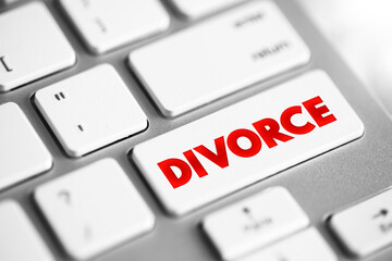 Divorce - canceling or reorganizing of the legal duties and responsibilities of marriage, text concept button on keyboard - obrazy, fototapety, plakaty