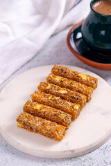 Turkish Delight with Pistachio. Turkish delight with kadayif on a concrete floor. Traditional Turkish delicacies. close up