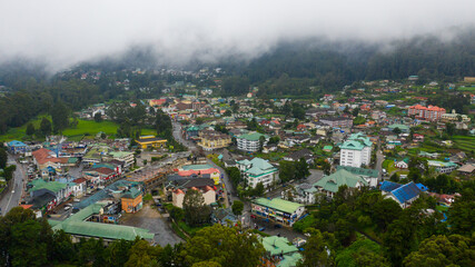 Mountain town of Nuwara Eliya among tea plantations in mountains. Sri Lanka.