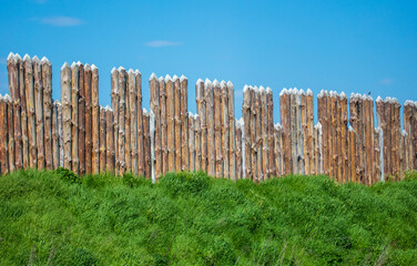 Wooden fence against the sky.