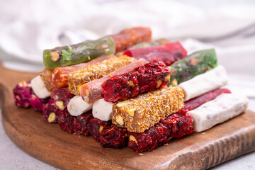 Turkish delight varieties on a concrete floor. Traditional Turkish delicacies. local name parmak lokum. close up