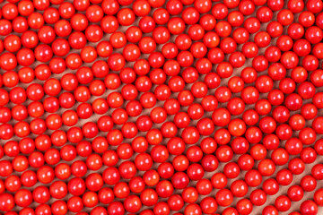 Necklaces and bracelets made from red coral. Background, texture