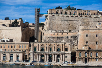 Fototapeta premium Ancient architecture of the island in Valetta Malta. View of Malta from the water.
