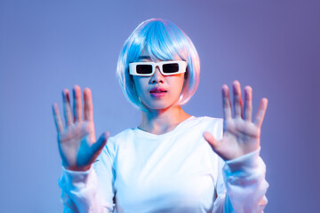 Young asian woman in white fashion crop sweatshirt wearing retro sunglasses posing dancing on the...