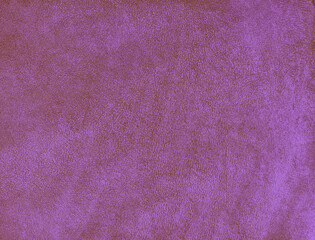 purple background with texture of suede leather