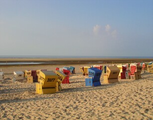 Beach chairs on a summer day at Langeoog beach - Strandkörbe an einem Sommertag am Strand von Langeoog