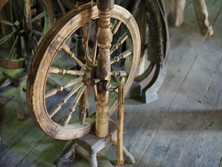 Spinning wheel spoke wheel spindle on wooden antique spinning machine