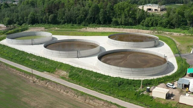 Livestock farm. Manure tanks and a methane production plant. Aerial view.