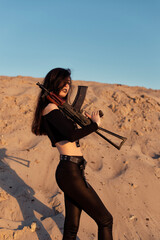 Girl with a gun in her hands