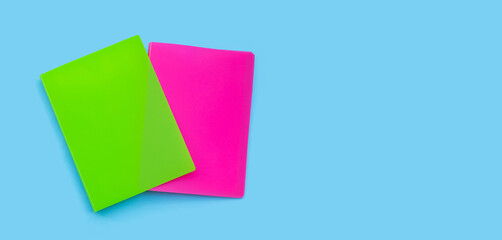 Office folders on blue background.