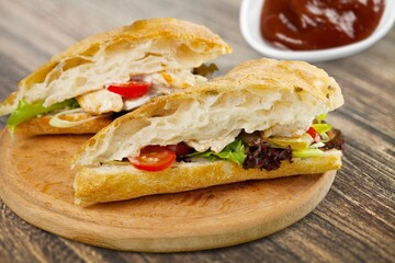 Tasty sandwich with vegetables, ham and cheese, traditional restaurant menu dish, food cooking recipe book cover.