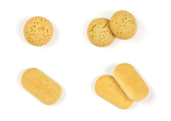Oatmeal round and wheat oblong baby cookies on a white isolated background. Children's sweets, a template for design.
