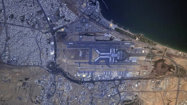 Airport map aerial satellite view from sky, sunrise animation of Muscat city airport, Oman. Based on image furnished by Nasa